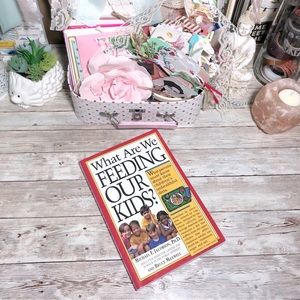 What Are We Feeding Our Kids? Paperback Book by Michael Jacobson & Bruce Maxwell